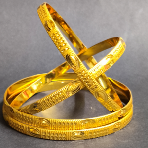 Traditional Oval Engraved Gold Polish Bangles